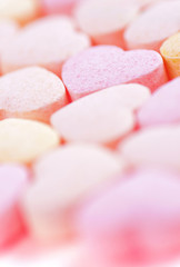 Sweet hearts shaped pink and orange Sugar Pills. Soft Focus.