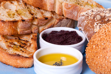 Arrangement of bread with sauces.