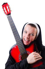 Fototapeta premium Nun playing guitar isolated on white