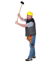 Tradesman holding a mallet