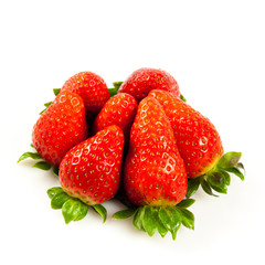 Strawberries with leaves. Isolated on a white background.