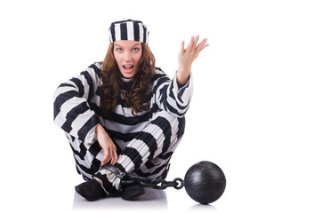 Prisoner in striped uniform on white