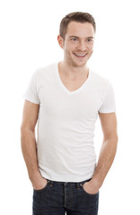 Obraz premium Przystojny młody mężczyzna w t-shirt & dżinsy - na białym tle nad białym