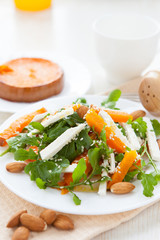 light salad with pumpkin and almonds