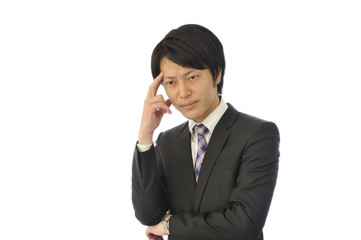 悩むビジネスマン