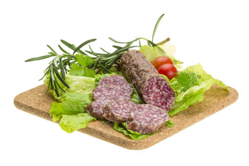 Salami with rosemary, salad and tomatoes