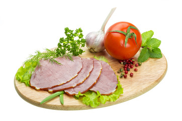 Ripe fresh ham with vegetables