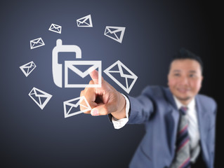 Business man touching technology of phone messages