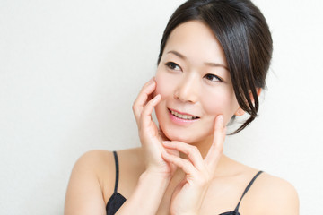 Beautiful asian woman on white background