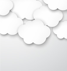 Paper white clouds on grey.