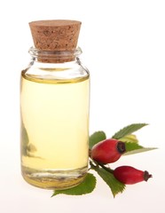 bottle of rose oil - isolated