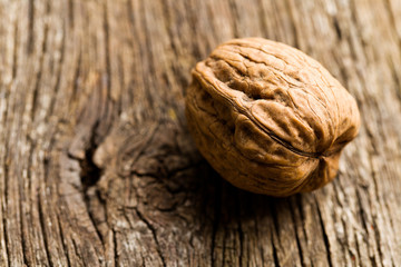 walnut on old wooden table