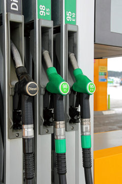 Fuel Pump Nozzles at Filling Station