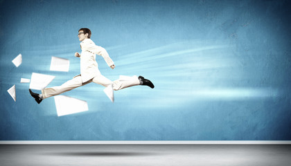 Image of running businessman