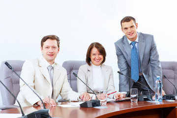 Three businesspeople at meeting