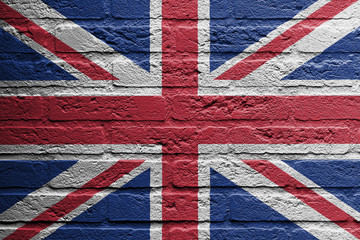 Brick wall with a painting of a flag