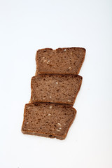 Slices of dark bread isolated over white