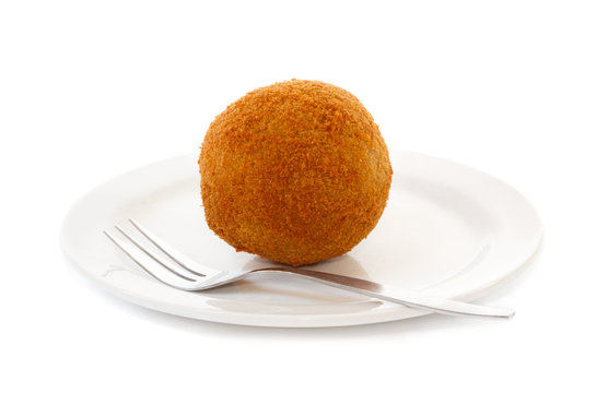 Egg ball (Eierbal) served on saucer
