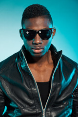Fototapeta premium Cool urban stylish black american man. Fashion studio shot.