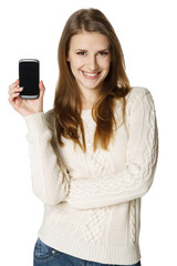 Fototapeta premium Happy young woman showing her mobile phone