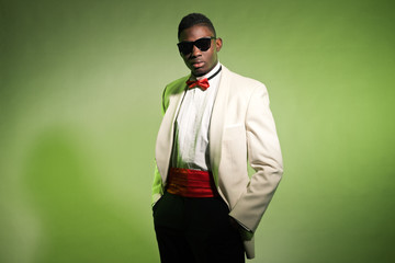 Cool black american man in suit wearing sunglasses. Fashion shot