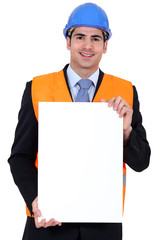 Inspector with a poster