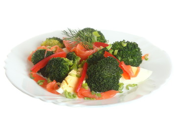 Salad with salmon and broccoli isolated on white background