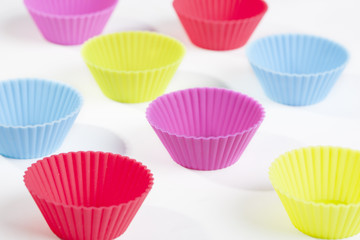 The image is a groups of cupcake molds