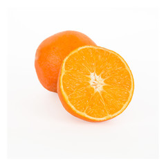 Ripe orange and its half.