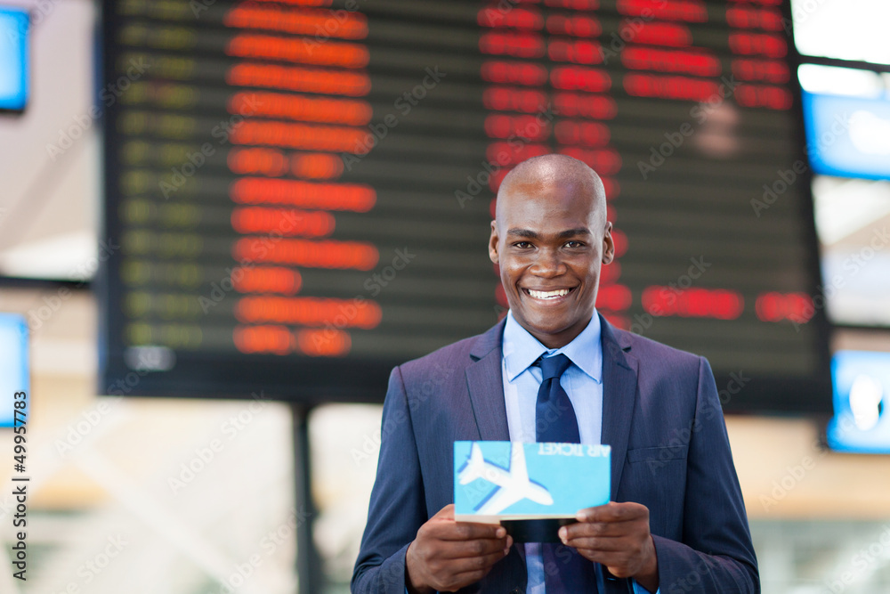 Wall mural african business traveler in airport