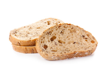 Healthy whole grain sliced bread with sunflower seeds on white b
