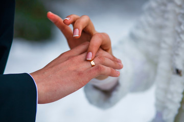 hands of the bride groom ring close-up at a wedding in Russia