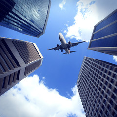 Fototapeta na wymiar Modern city buildings and aircraft in Brisbane