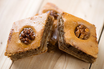 Baklava with walnuts and honey, studio shot