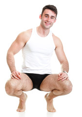 Obraz premium Healthy happy young man with towel isolated