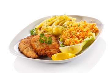 Pork chops, mashed potatoes and vegetable salad