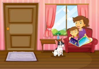Poster Een moeder en een meisje lezen met een hond in huis © GraphicsRF