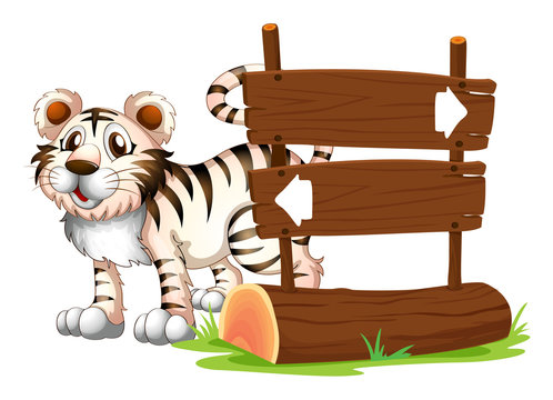 A tiger at the back of a wooden signboard