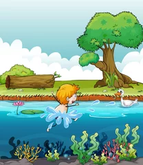 Poster Een jongen die met een eend in de rivier zwemt © GraphicsRF