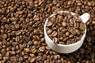 Cup with coffee beans