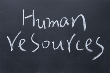 human resources title written with chalk on blackboard