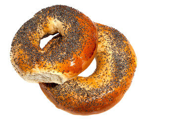 bagels with poppy seeds on white background