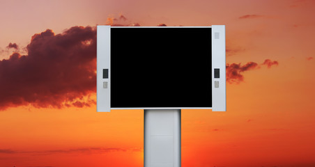 Blank advertising billboard with sunset sky background