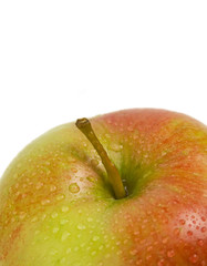 Fresh ripe apple with drops of water