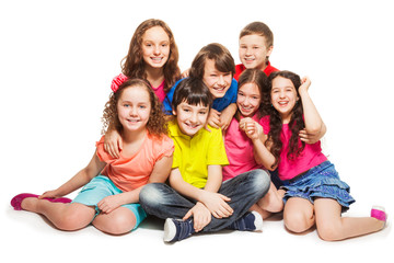 Obraz premium Group of happy kids sitting together