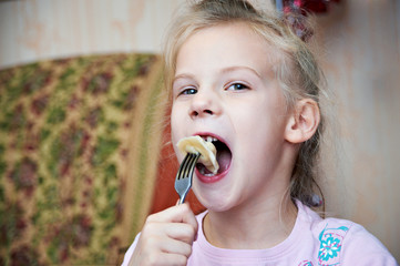 Girl eating dumplings