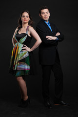 Happy young couple romantic together. Man and woman. Studio shot