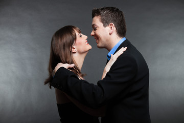 Romantic young couple in love. Man and woman. Studio shot.