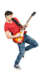 Young guitarist plays on the electric guitar