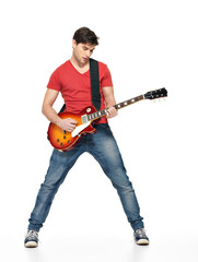 Guitarist man plays on the electric guitar